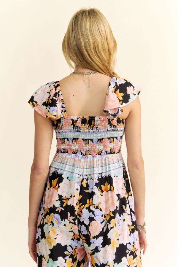 FLORAL BORDER SMOCKED BODICE RUFFLED JUMPSUIT