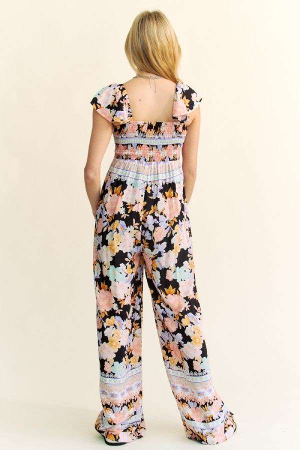 FLORAL BORDER SMOCKED BODICE RUFFLED JUMPSUIT