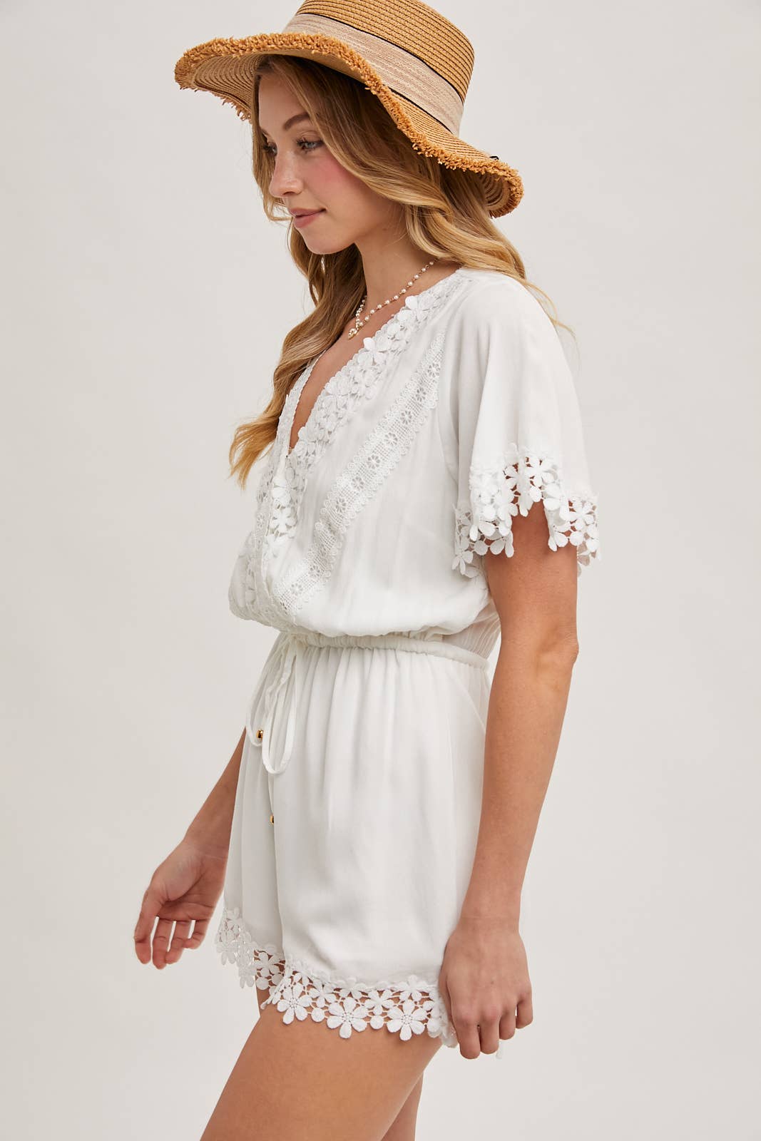 WRAP FLORAL LACE TRIMMED DRAWSTRING ROMPER