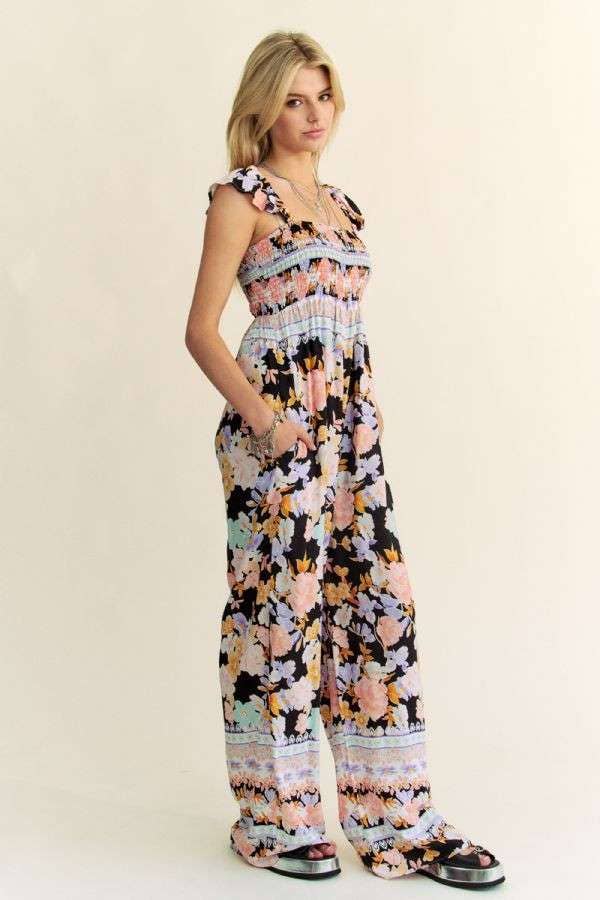 FLORAL BORDER SMOCKED BODICE RUFFLED JUMPSUIT