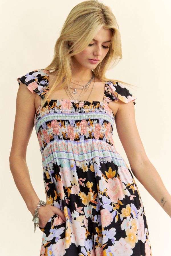 FLORAL BORDER SMOCKED BODICE RUFFLED JUMPSUIT