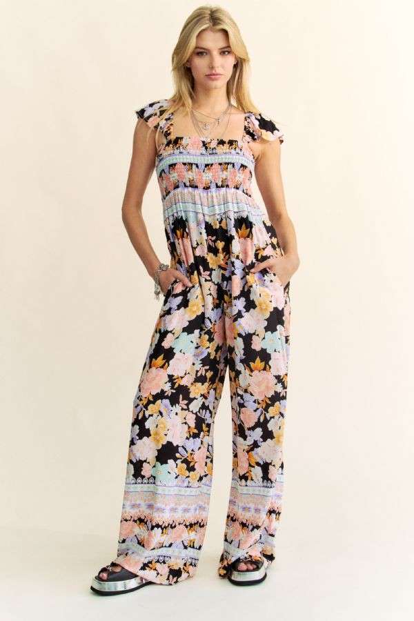 FLORAL BORDER SMOCKED BODICE RUFFLED JUMPSUIT