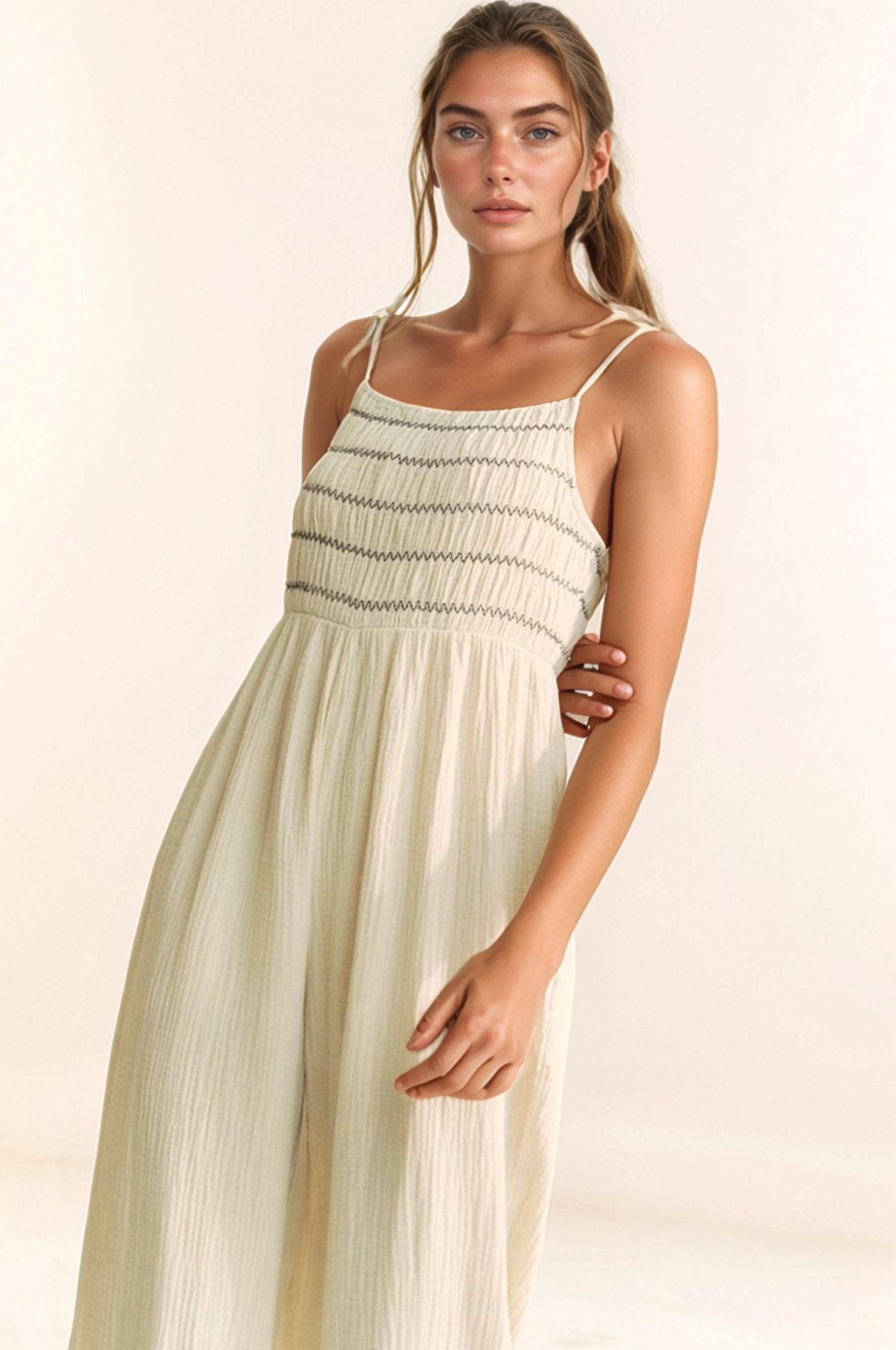 GARMENT WASHED MULTI SMOCKED TIE STRAPS JUMPSUIT