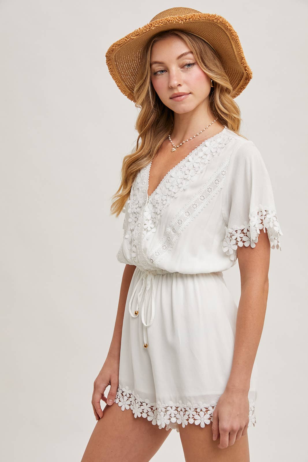 WRAP FLORAL LACE TRIMMED DRAWSTRING ROMPER