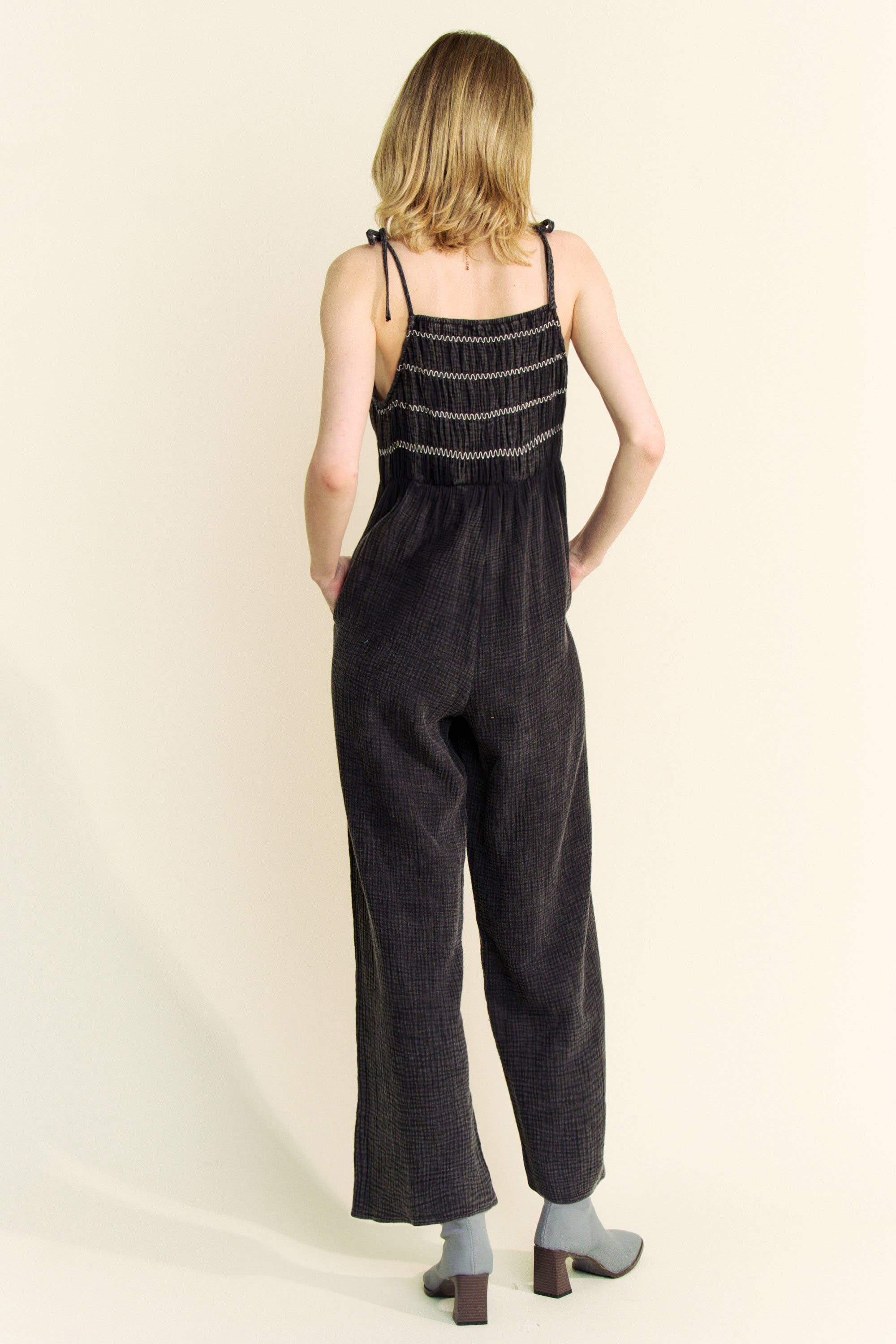 GARMENT WASHED MULTI SMOCKED TIE STRAPS JUMPSUIT